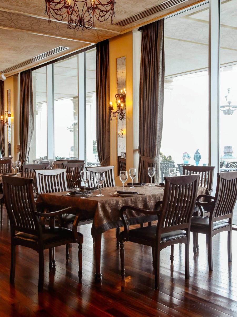 dining table with chairs and tableware